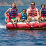 Family water sport adventure on the sea
